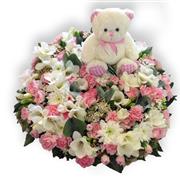 childs posy pad with soft toy