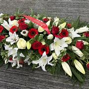 Casket spray lilies and gerbera