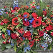 Casket spray red and blue