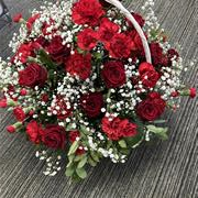 Basket  red roses and carnations 
