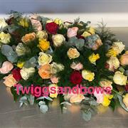 Mixed rose casket spray 